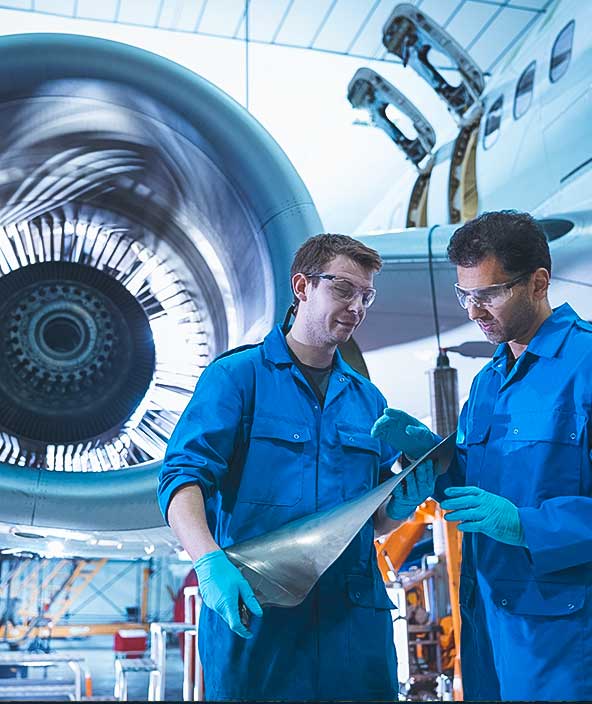 Aerospace stakeholders at a production facility