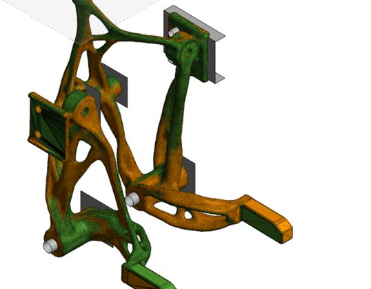 Image of a green and orange metal part in 3D
