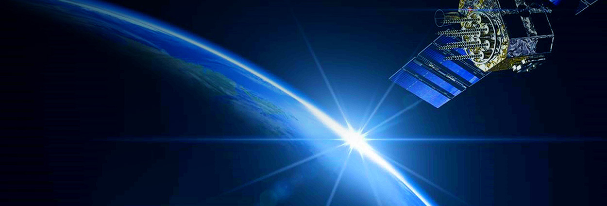 View of Earth from space showing an orbiting satellite