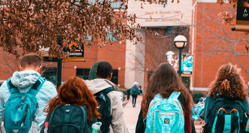 students with backpacks