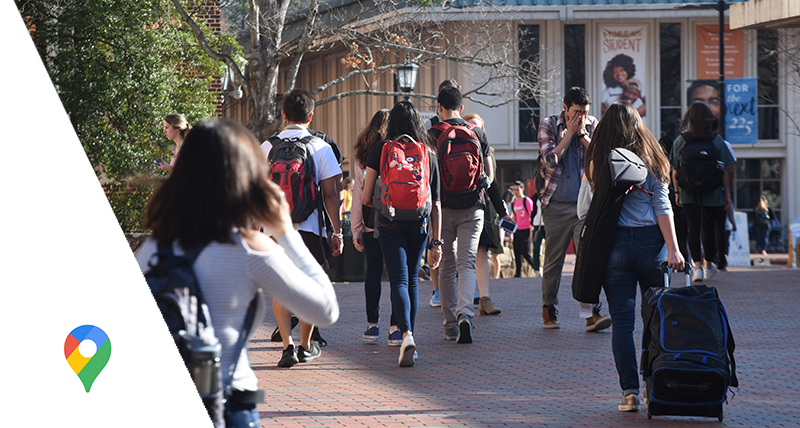 Students walking down a crowded street