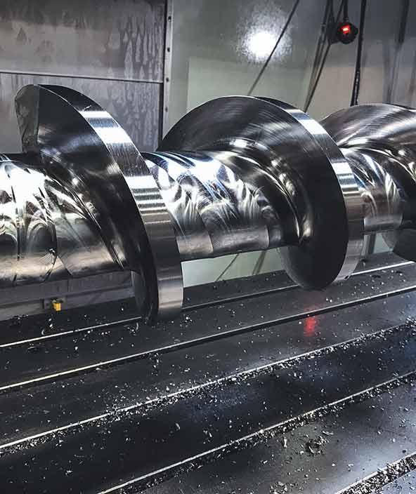 A machined metal part at custom processing equipment manufacturer The Bonnot Company.