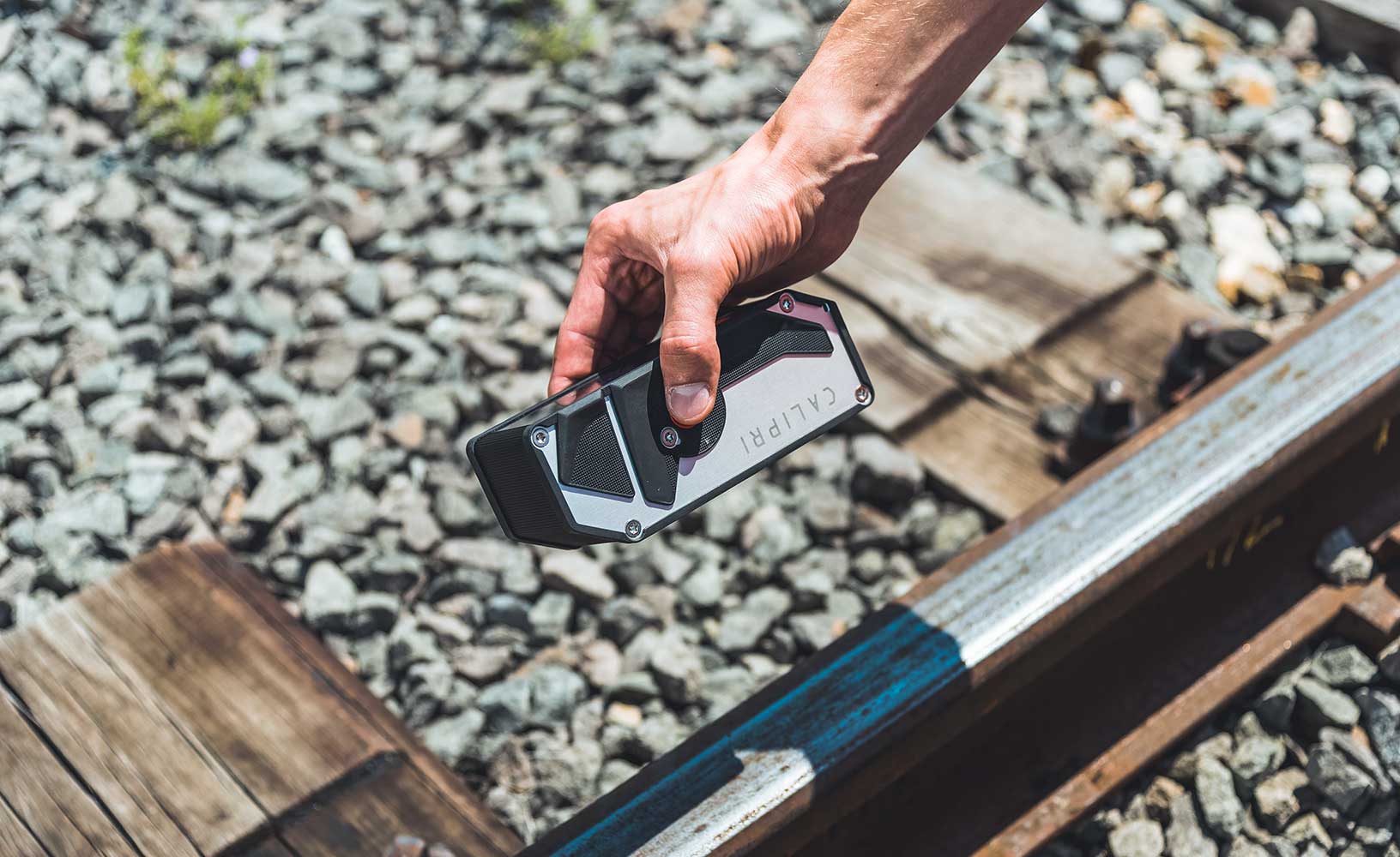 Close up view of CALIPRI handheld sensor at work in rail and transit network inspection