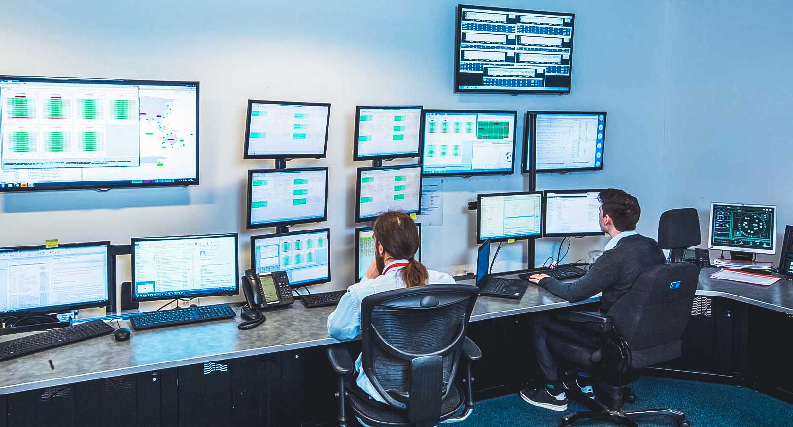 Our 24/7 support team are pictured working at one of our global network control centres.