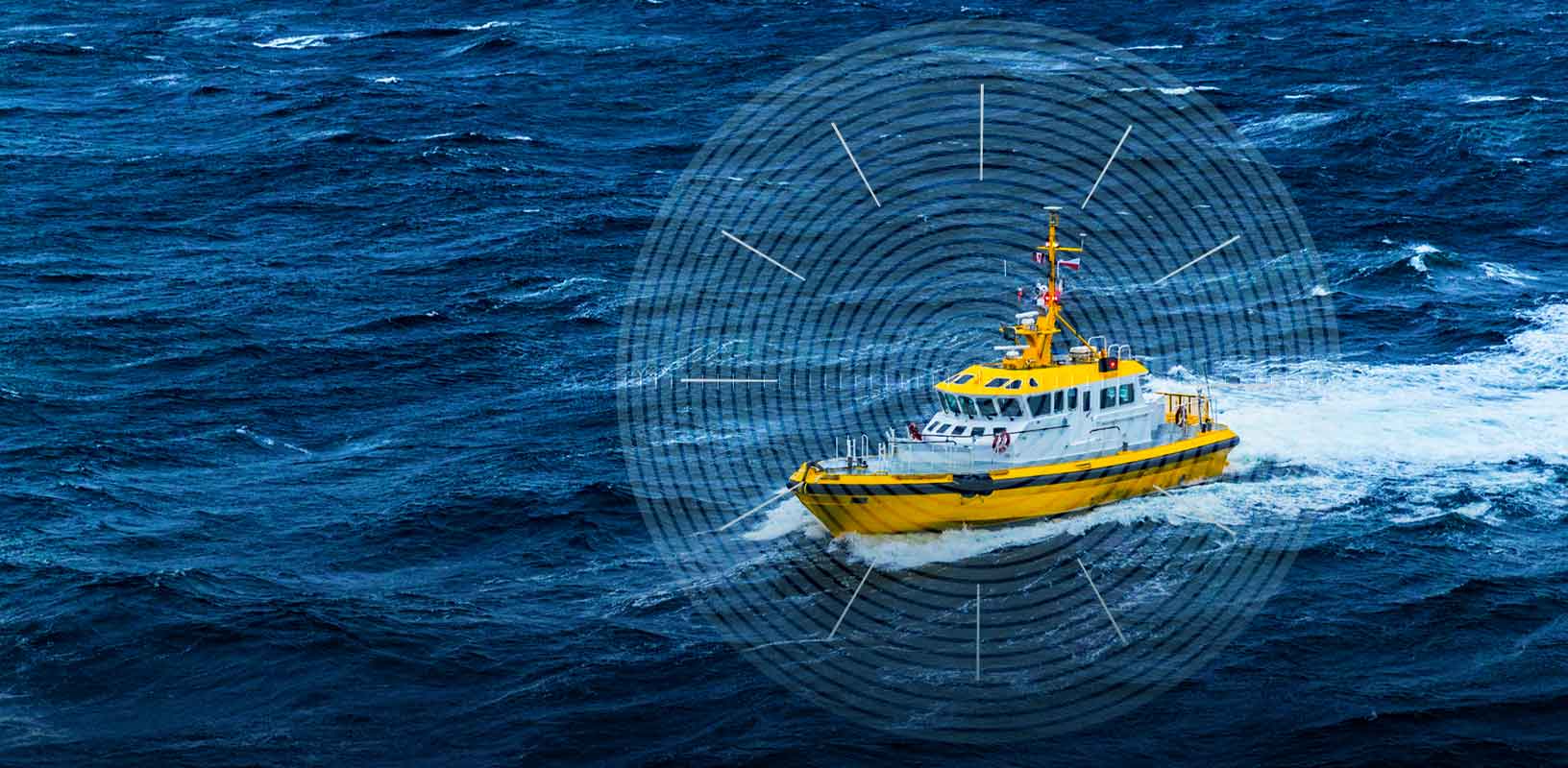 A yellow marine port vessel navigating rough seas, supported by Oceanix correction services.
