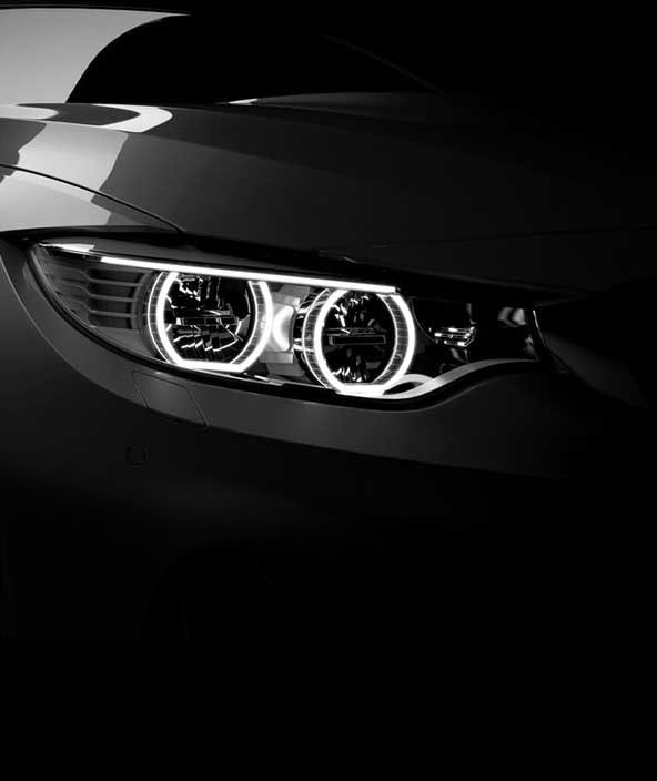 Grey generic stylish sport coupe car with laser LED headlights on dark black background