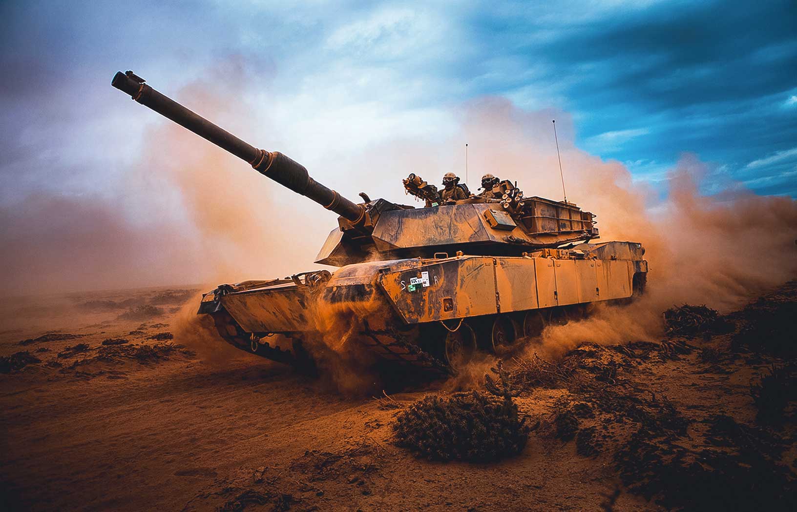 An Abrams tank charging forward