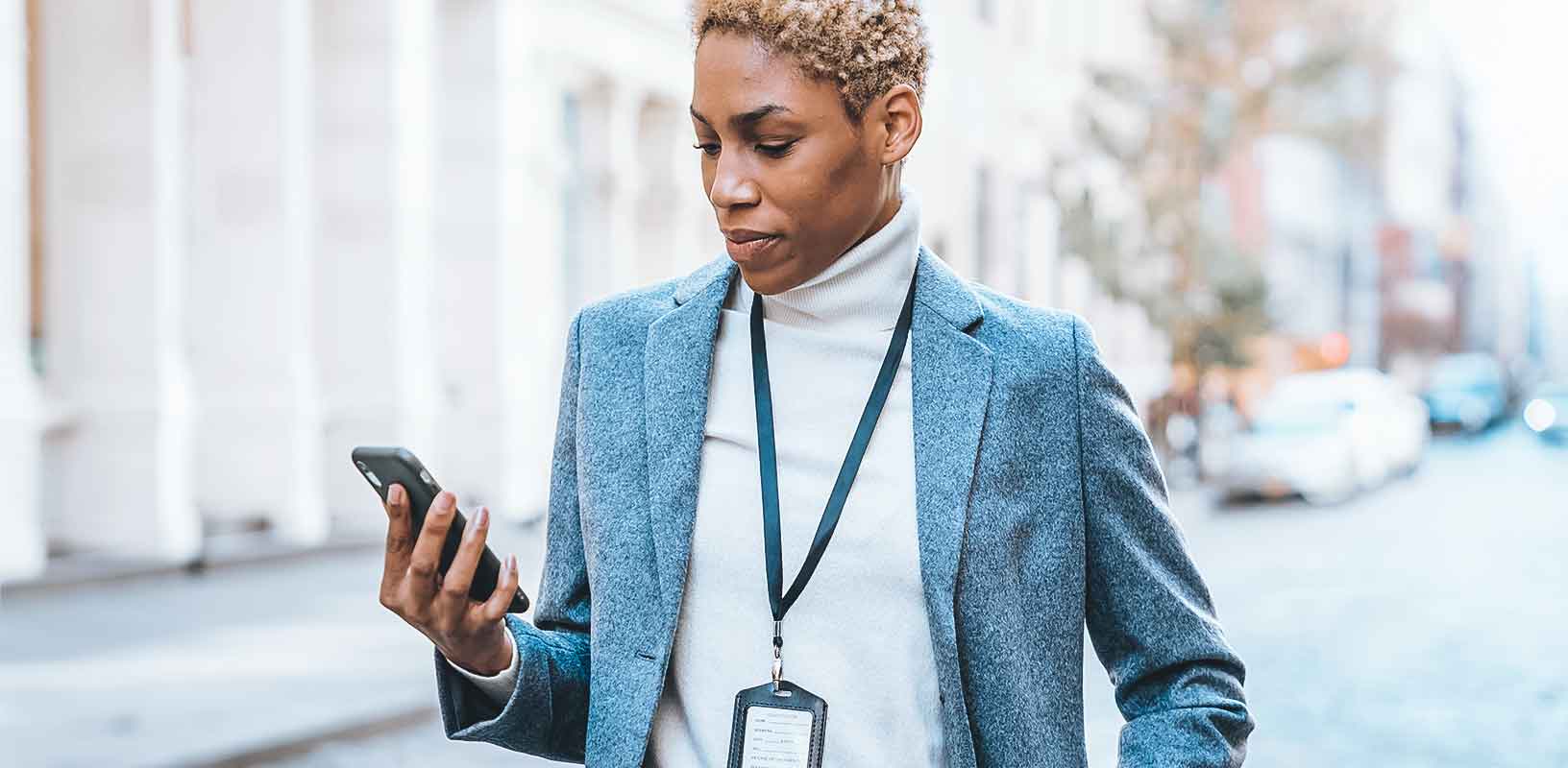 Woman reporting a security or safety problem from her mobile phone