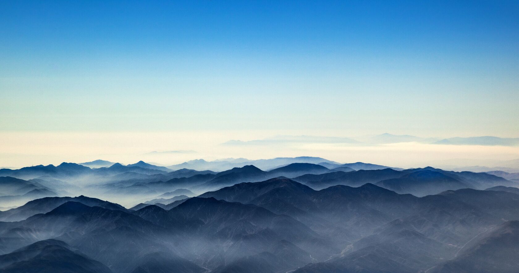 Distant mountains with a hazy sky
