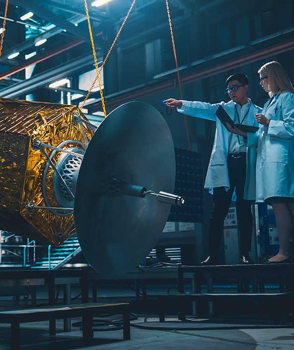 Workers in an advanced manufacturing facility