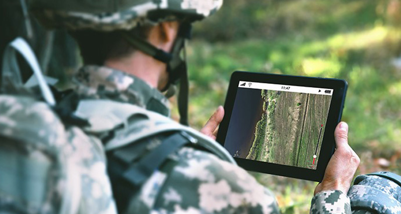 Soldier using LuciadMobile on tablet