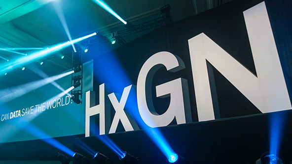 HxGN LIVE Global hero letters with coloured strobe lighting for dramatic effect
