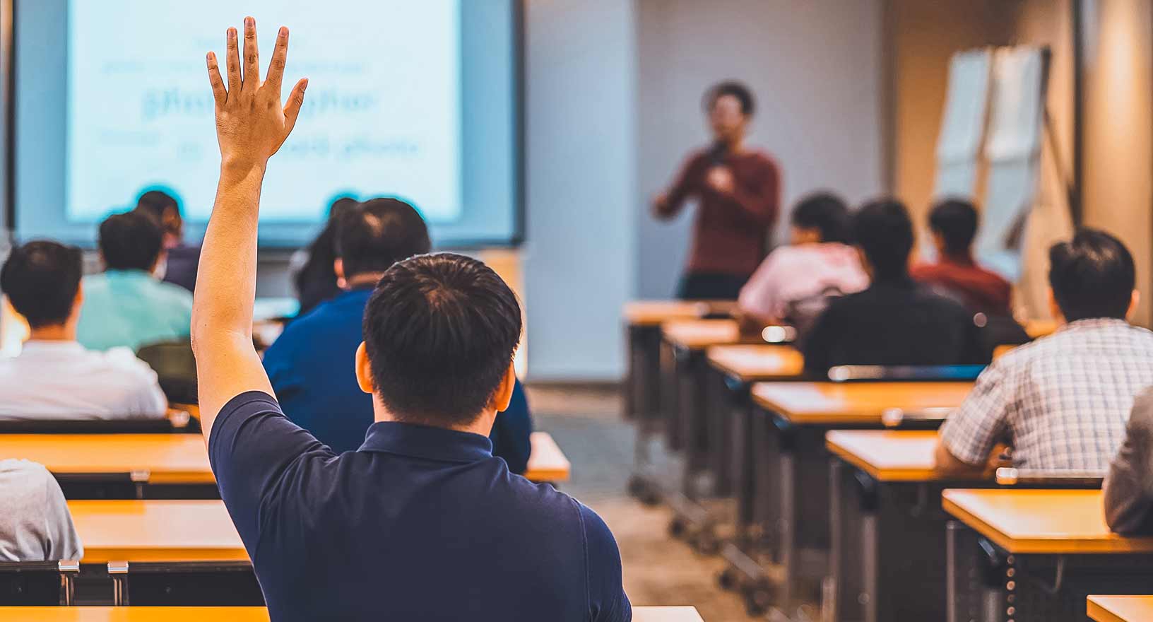 Educator in front of the classroom