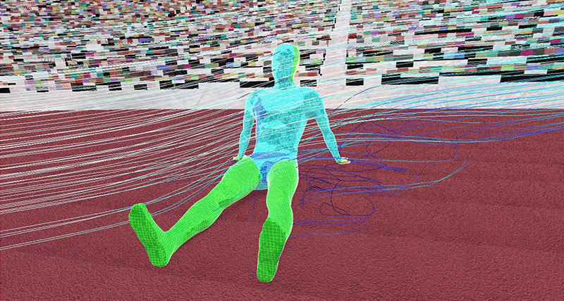 A computational fluid dynamics simulation of an athlete sat on a running track showing temperature ranges on different parts of the body. The torso and head are blue and the legs a green. 
