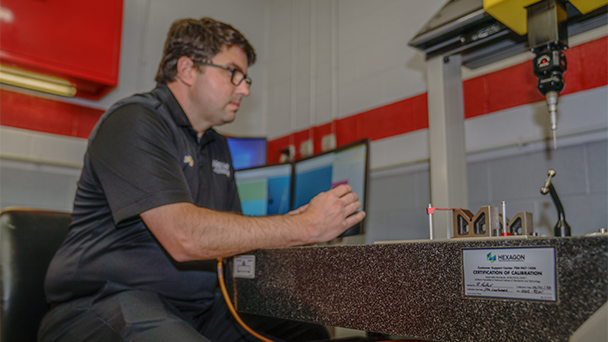 Tad Merriman – Engineering Manager, Engine Shop, Hendrick Motorsports at the stationary CMM