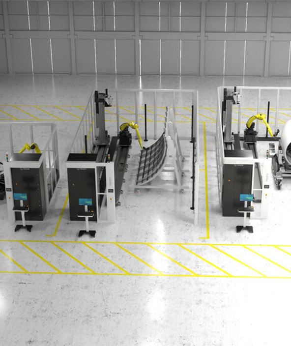 An automated cell inspecting an aircraft fuselage piece.