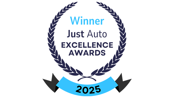 An award with a rosette showing the Hexagon logo and the the category the company won in at the JustAuto Excellence Awards.