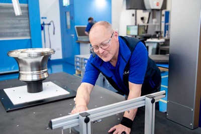 Member of Castle inspection team preparing the next measurement routine on the GLOBAL S CMM.