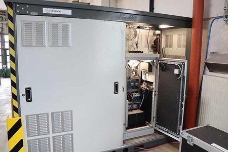 The control cabinet and cooling system are pre-installed in a housing.