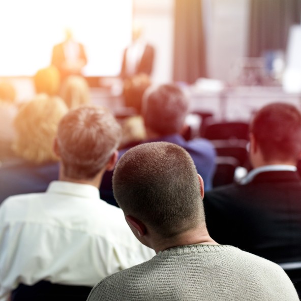 Audience listening to speakers