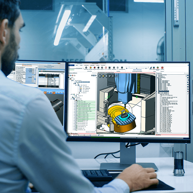 Ingeniero ante la pantalla de un ordenador trabajando con un software de diseño