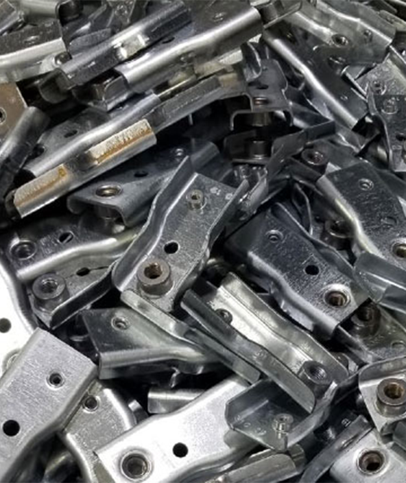 Sheet metal moulded parts in a pile