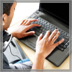 Image of a person using a laptop