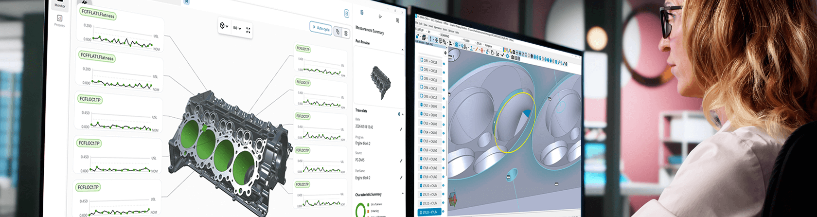 Dual monitors display detailed engine block analytics and precision 3D CAD modeling within a modern engineering workspace