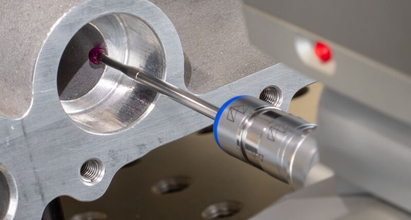 A top down view of a touch trigger probe inspecting a workpiece