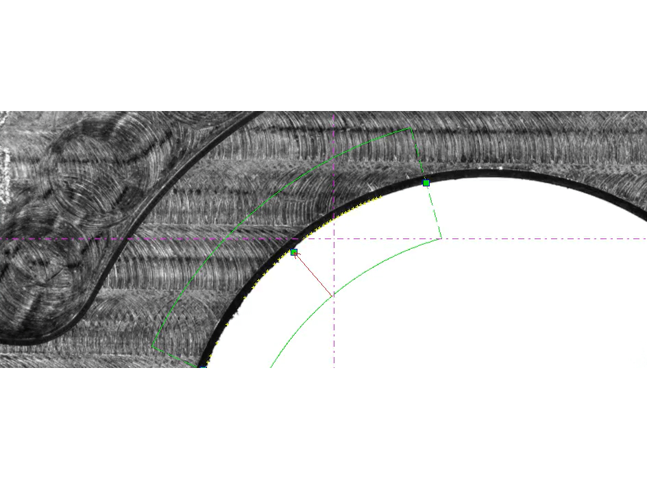 Close-up of a textured surface with overlaid geometric lines in green and magenta, illustrating image processing techniques like edge extraction.