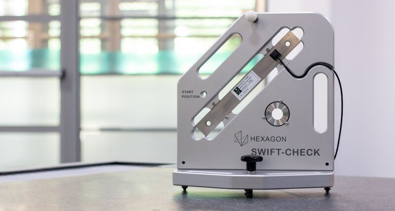 Hexagon's Swift-Check artefact facing forward to show detail and is placed on a CMM