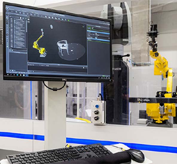 Hexagon's robotic automation demonstrating software and tracker at Skoda manufacturing plant