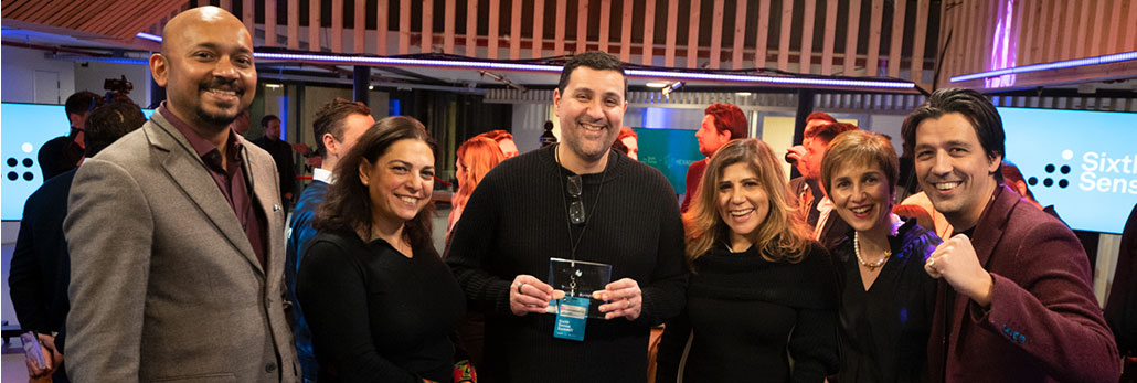 Winners of Hexagon's Sixth Sense cohort 2, GelSight, holding their award