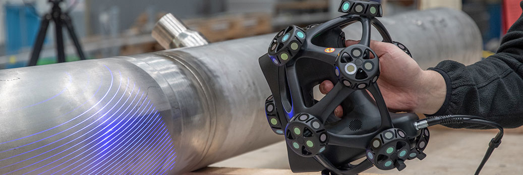 Handheld 3D scanner inspecting a large tube