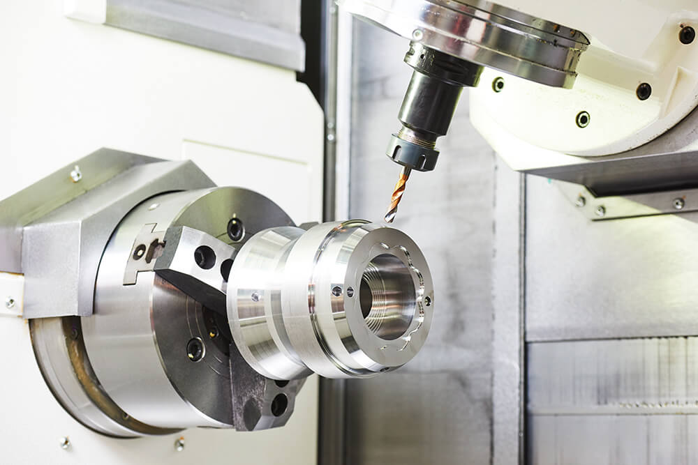 metalworking industry: drilling a hole on modern metal working machining center