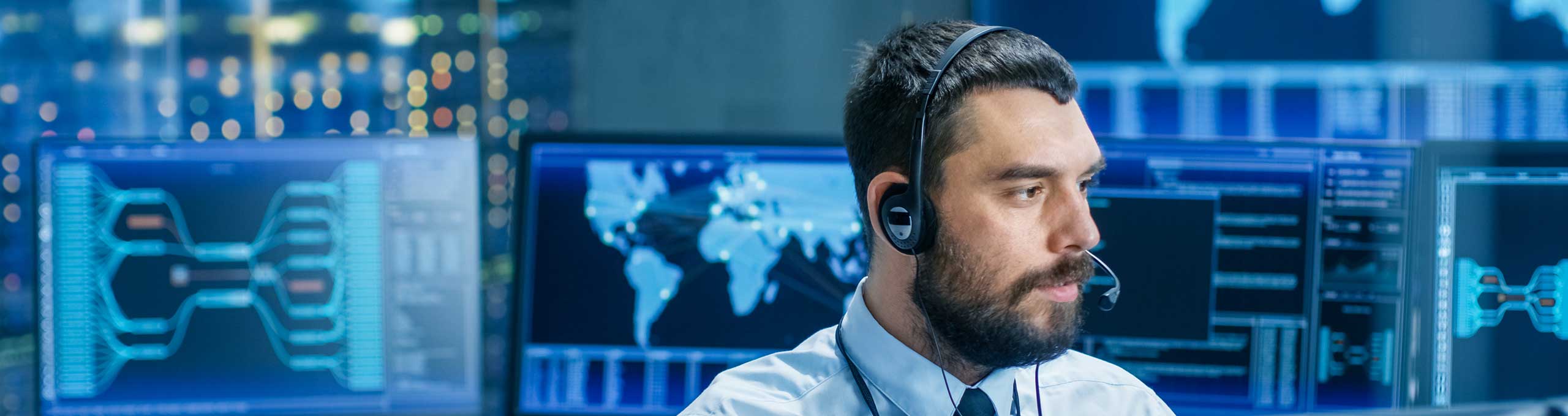 man with headset using HxGN OnCall software