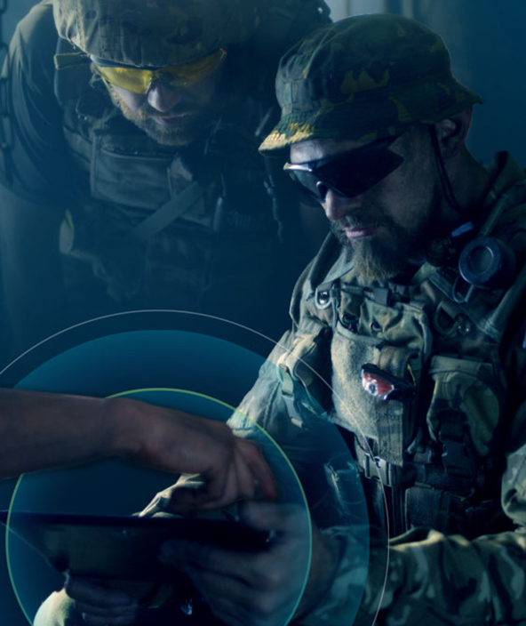 soldiers looking at information on a tablet