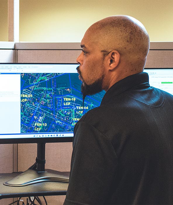 Worker using computer at EPB Chattanooga