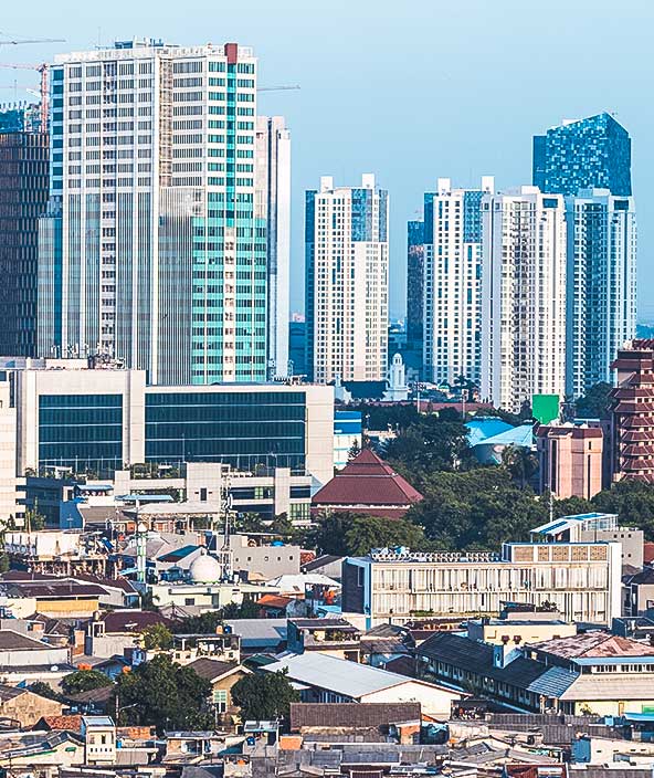 Low rise residential district and towers in Jakarta