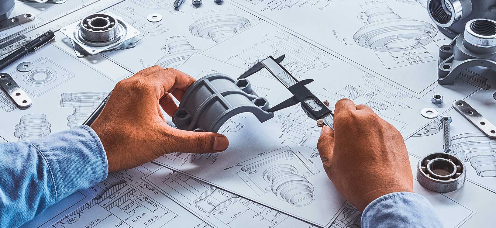 Engineer technician designing drawings & mechanical parts using Hexagon 3D design tools