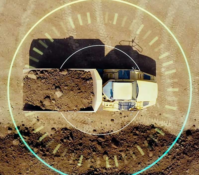 Overhead image depicting Hexagon’s life-of-a-mine solutions, connecting and leveraging data from planning to operations — from safety to sustainable reclamation — making it possible for customers to extract 100% of a mine’s potential value safely, sustainably and profitably.