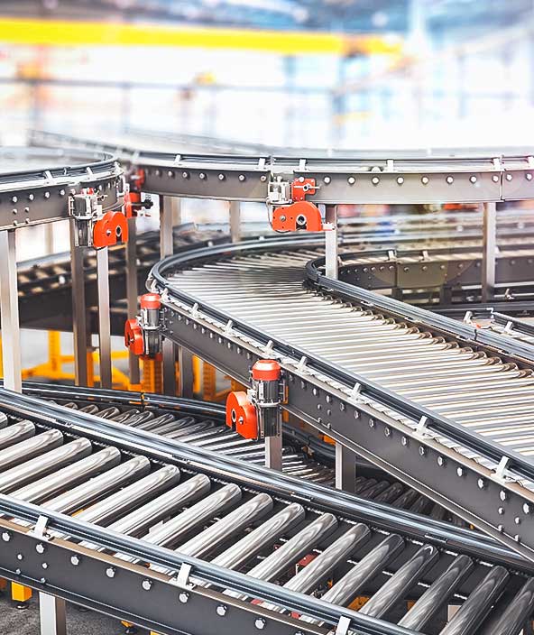 Blank conveyors on a blurred factory background