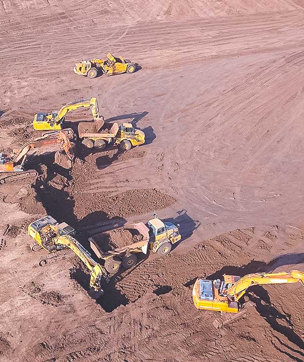 Several Earth moving equipment at new development site