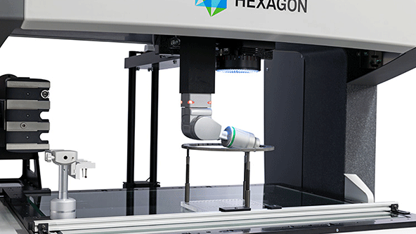 A mulitsensor CMM with a contactless scanner inspecting a part