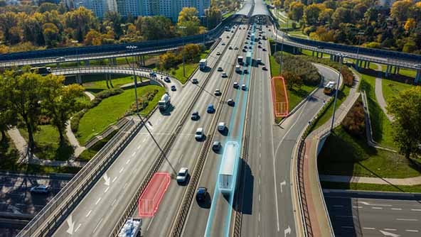 Aerial view of a busy highway showcasing traffic flow, symbolizing resilience and integrity technology.