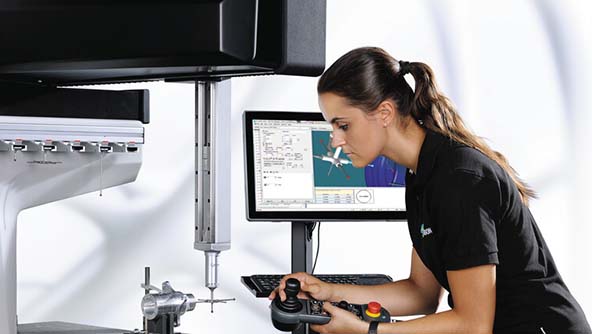 A picture illustrating a technician utilizing a shop floor CMM.