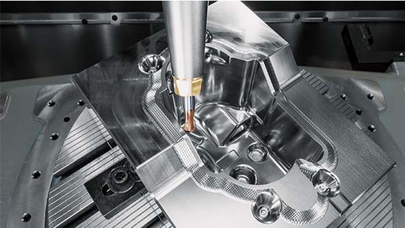 Image of a machine precisely cutting metal, demonstrating the capabilities of WORKNC CAM software
