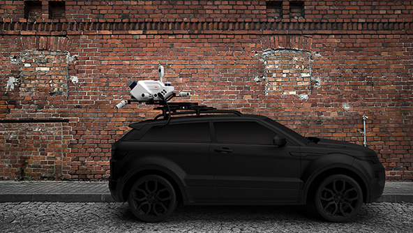 Leica Pegasus TRK mounted on top of a hybrid car