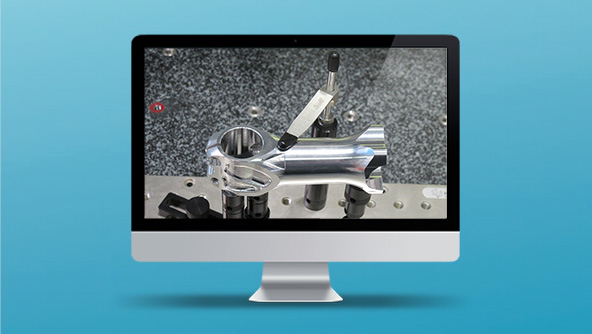 Image showcasing a computer screen, featuring visual representations of CMM Fixturing Systems