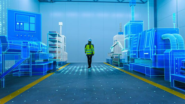 An engineer doing a line walk between manufacturing equipment